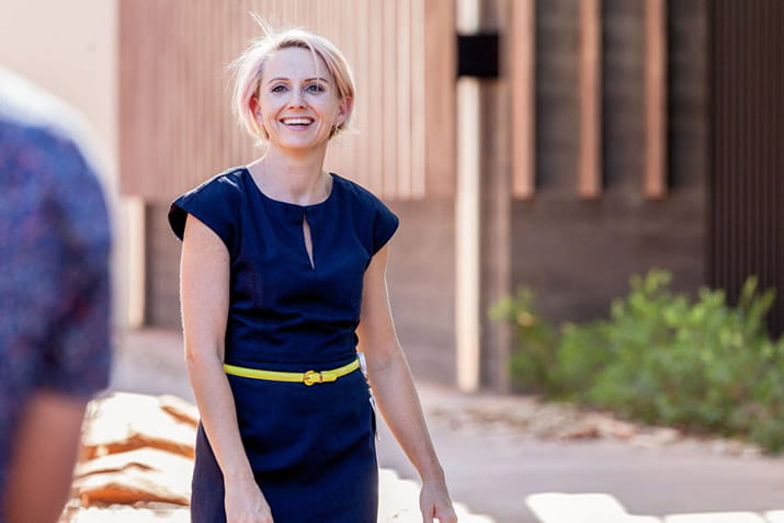 health-industry-management-student-brenda-outside-hospital